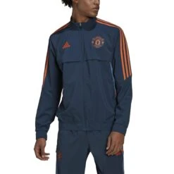 ADIDAS Trainings-Trainingsjacke Manchester United Condivo 2022/23 -MACRON Verkaufsgeschäft adidas hh9322 4 apparel on model front view white