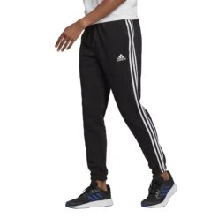 Hosen Adidas Essentials Fleece Tapered Elastic 16 Hosen Adidas Essentials Fleece Tapered Elastic -MACRON Verkaufsgeschäft gk8822 app on model standard white